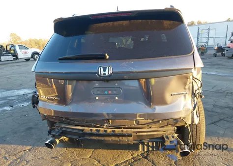 2021 Honda Passport 2Wd Touring z USA, uszkodzony, nr VIN 5FNYF7H98MB012918